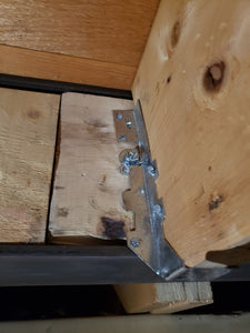 Contractor cut joist hangers to make them fit